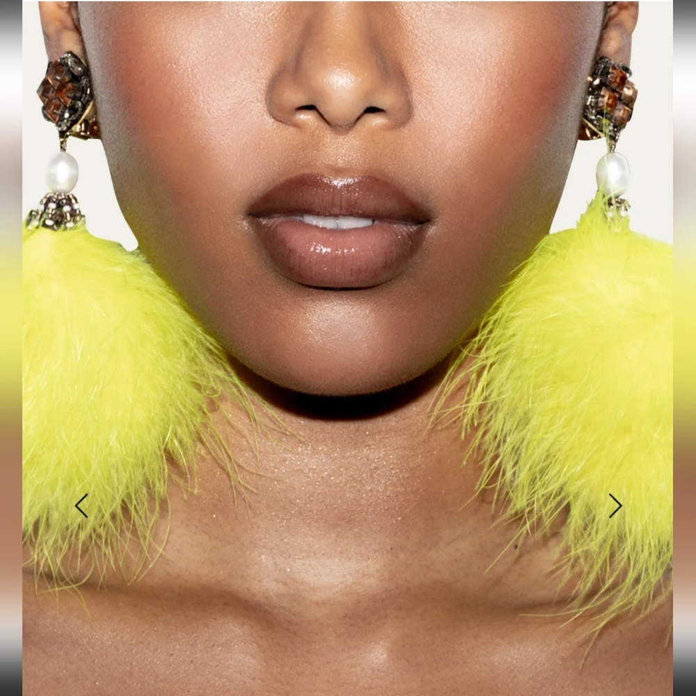 Ranjana Khan Neon yellow  Marabou feather Pom earring is a must.